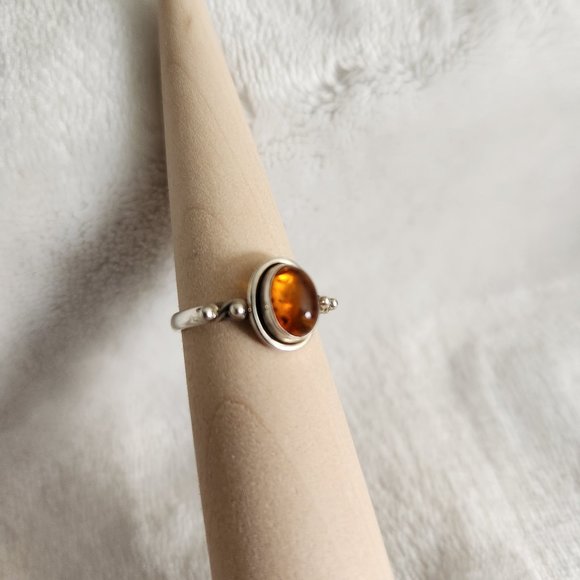 Jewelry - Sterling Silver and Amber Ring. Size 6. Lightly used.